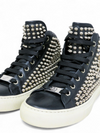 Tenis "Studs"