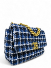 Bolso "Tweed Quilted Medium Chanel 19 Flap"