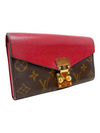 Billetera "LV Monogram Coated Canvas Pallas Wallet"