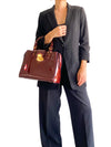 Bolso "Monogram Vernis Melrose Avenue Amarante"