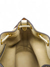 Bolso "Mini T Monogram Bucket Bag"