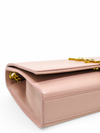 Bolso "Kate Medium Tassel in grain de poudre embossed leather"