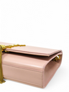 Bolso "Kate Medium Tassel in grain de poudre embossed leather"