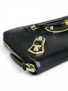 Billetera "Continental Metallic Edge Zip-Around"
