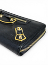 Billetera "Continental Metallic Edge Zip-Around"