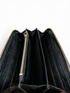 Billetera "Continental Metallic Edge Zip-Around"