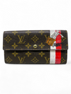 Billetera "Monogram Sarah Wallet Tintin Groom Limited Edition"