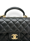Bolso "Lambskin Quilted Mini Top Handle Rectangular Flap"