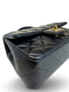 Bolso "Lambskin Quilted Mini Top Handle Rectangular Flap"