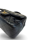 Bolso "Lambskin Quilted Mini Top Handle Rectangular Flap"