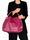 Bolso "Monogram Empreinte Artsy MM"