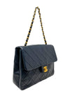 Bolso "Lambskin Quilted Vintage Mini Square Flap Bag"