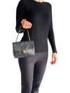 Bolso "Lambskin Quilted Vintage Mini Square Flap Bag"