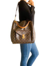 Cartera "Monogram Métis Hobo"