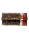 Billetera "Monogram Sarah Wallet Tintin Groom Limited Edition"