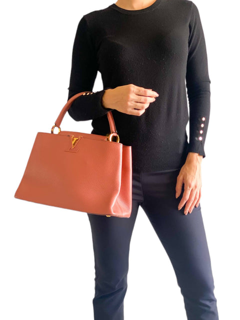 Bolso "Capucines MM Magnolia"