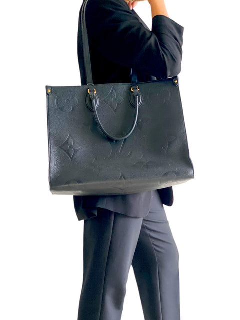 Bolso "Monogram Empreinte OnTheGo GM"