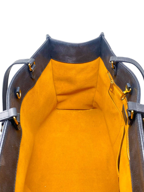 Bolso "Monogram Empreinte OnTheGo GM"