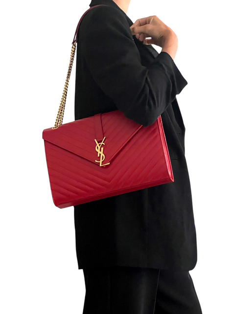 Bolso "Large Monogram Matelasse Envelope Bag"