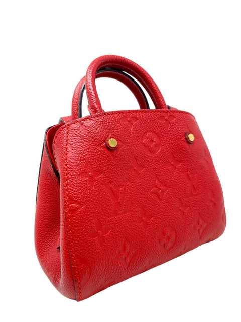 Bolso "Montaigne Nano Monogram Empreinte Cerise"