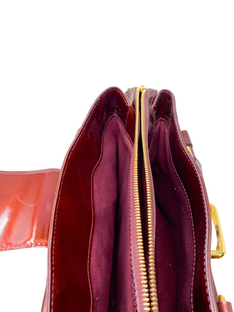 Bolso "Monogram Vernis Melrose Avenue Amarante"