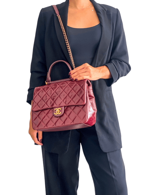 Bolso "Gold Bar Top Handle Bag Quilted Calfskin"