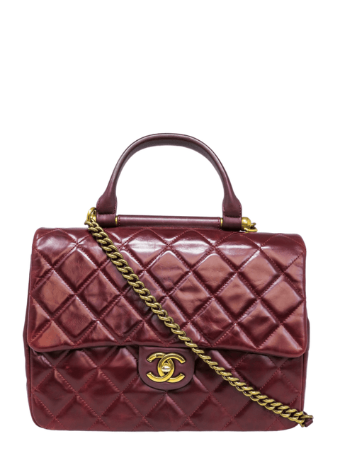 Bolso "Gold Bar Top Handle Bag Quilted Calfskin"