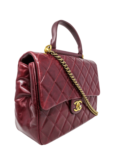 Bolso "Gold Bar Top Handle Bag Quilted Calfskin"