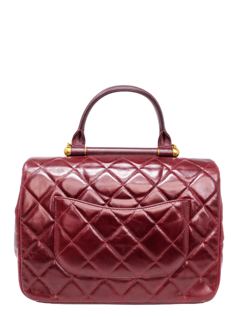 Bolso "Gold Bar Top Handle Bag Quilted Calfskin"