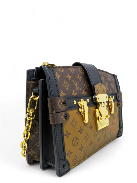 Bolso "Trunk Clutch Monogram Reverse"