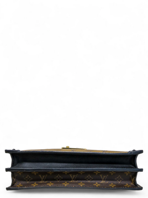 Bolso "Trunk Clutch Monogram Reverse"
