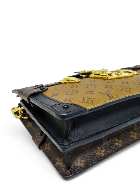 Bolso "Trunk Clutch Monogram Reverse"