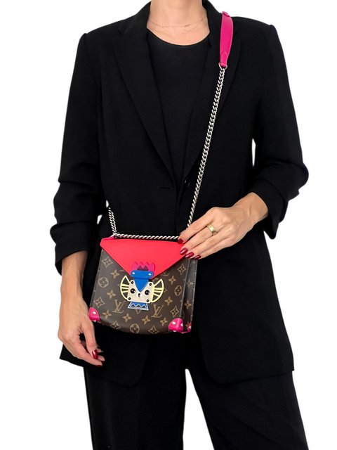 Bolso "Monogram Tribal Mask Pochette"