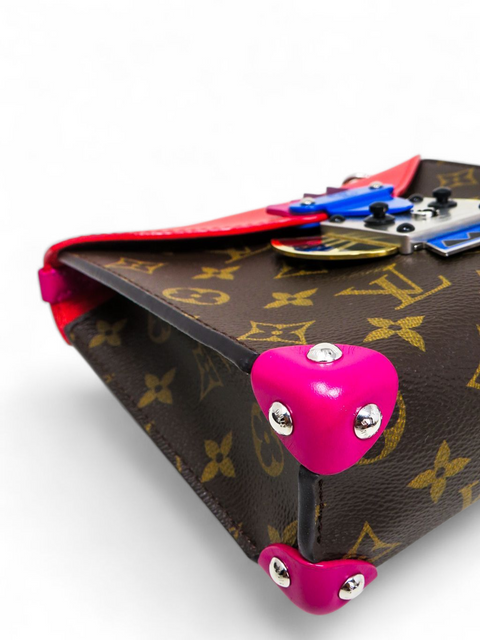 Bolso "Monogram Tribal Mask Pochette"