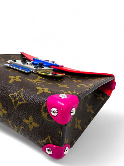 Bolso "Monogram Tribal Mask Pochette"