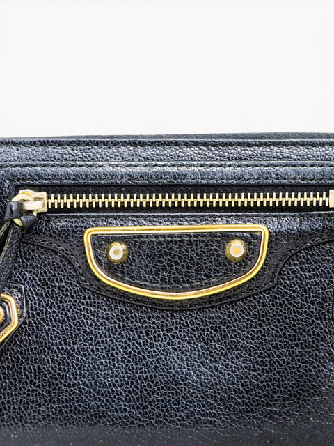 Billetera "Continental Metallic Edge Zip-Around"