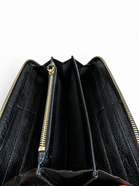 Billetera "Continental Metallic Edge Zip-Around"
