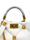 Bolso "Roman Stud Top Handle Bag"