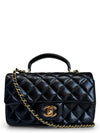 Bolso "Lambskin Quilted Mini Top Handle Rectangular Flap"