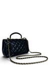 Bolso "Lambskin Quilted Mini Top Handle Rectangular Flap"
