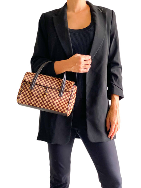 Bolso "Damier Sauvage Lionne"