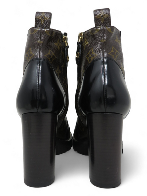 Botas "Patent Calfskin Monogram Star Trail Ankle Boots"