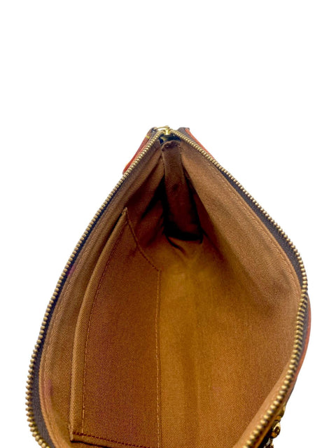 Bolso "Monogram Riveting Pochette Accessories"