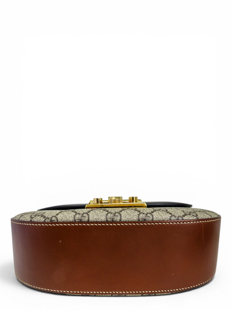 Bolso "Padlock Saddle Shoulder Bag"