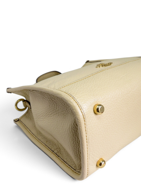 Bolso "Coach x Peanuts Deempsey Tote 22"