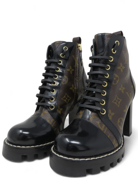 Botas "Patent Calfskin Monogram Star Trail Ankle Boots"