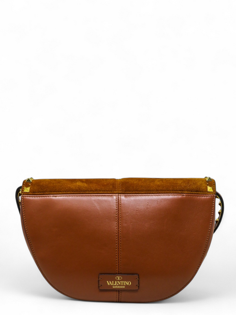 Bolso "Suede Calfskin Rockstud Halfmoon Saddle Bag"