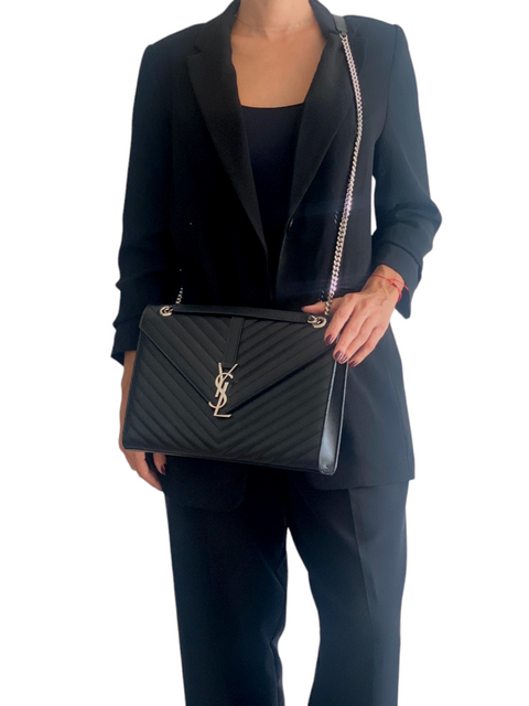 Bolso "Large Monogram Matelasse Envelope Bag"