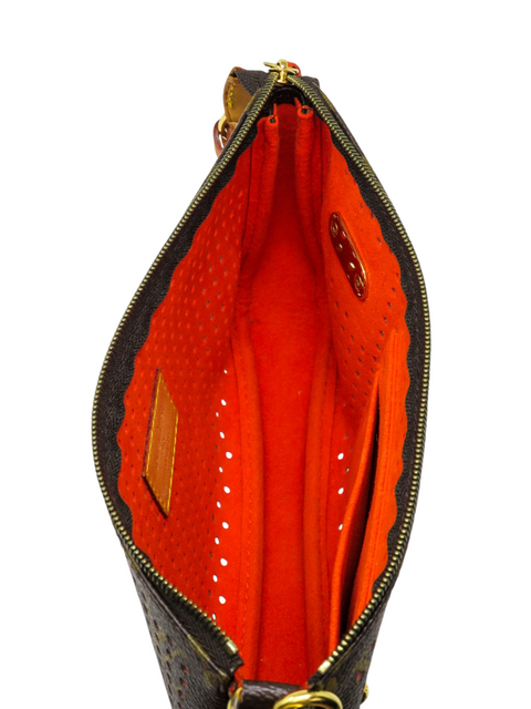 Bolso "Monogram Perforated Pochette Accessories"