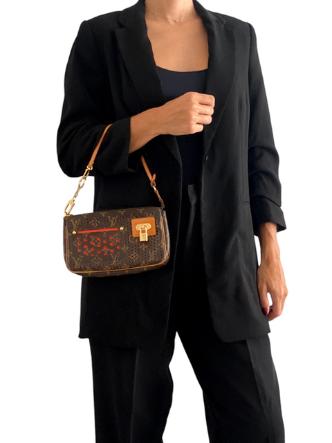 Bolso "Monogram Perforated Pochette Accessories"